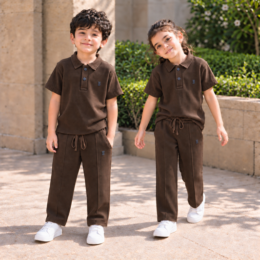 BORN 78 Waffle-Knit Polo Cord Set in brown โ natural boy and girl lifestyle image
