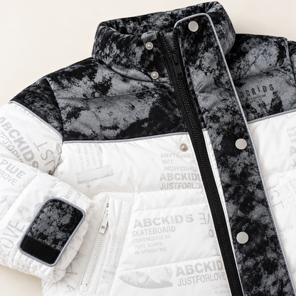 Monochrome jacket detail showing stand collar, zip and snap fastening, cuff tab and zipped pocket