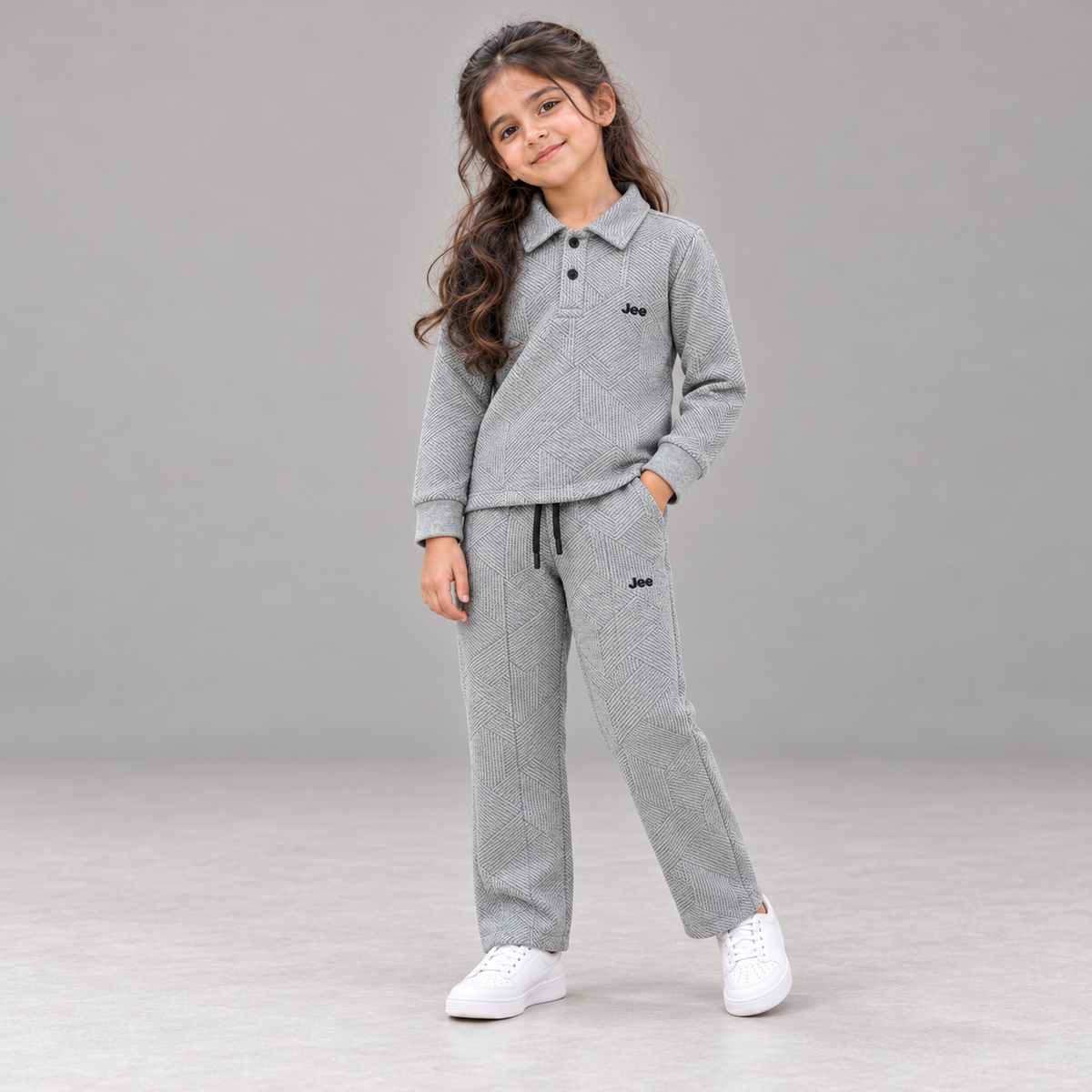 Girl wearing the Stone Grey Geometric Textured Polo Winter Co-ord Set