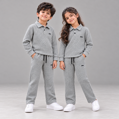 Boy and girl wearing Born78 Stone Grey Geometric Textured Polo Winter Co-ord Set