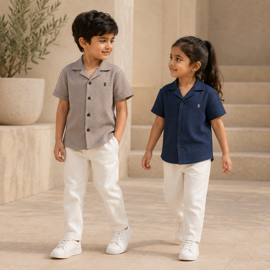 Two children wearing Born 78 Waffle Button Down shirts