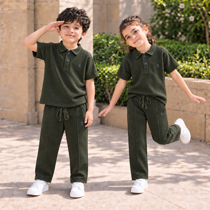 BORN 78 Waffle-Knit Polo Cord Set in army green — natural boy and girl lifestyle image