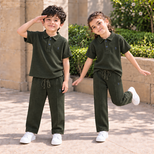 BORN 78 Waffle-Knit Polo Cord Set in army green — natural boy and girl lifestyle image