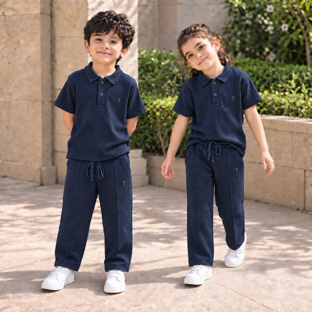 BORN 78 Waffle-Knit Polo Cord Set in navy blue — natural boy and girl lifestyle image